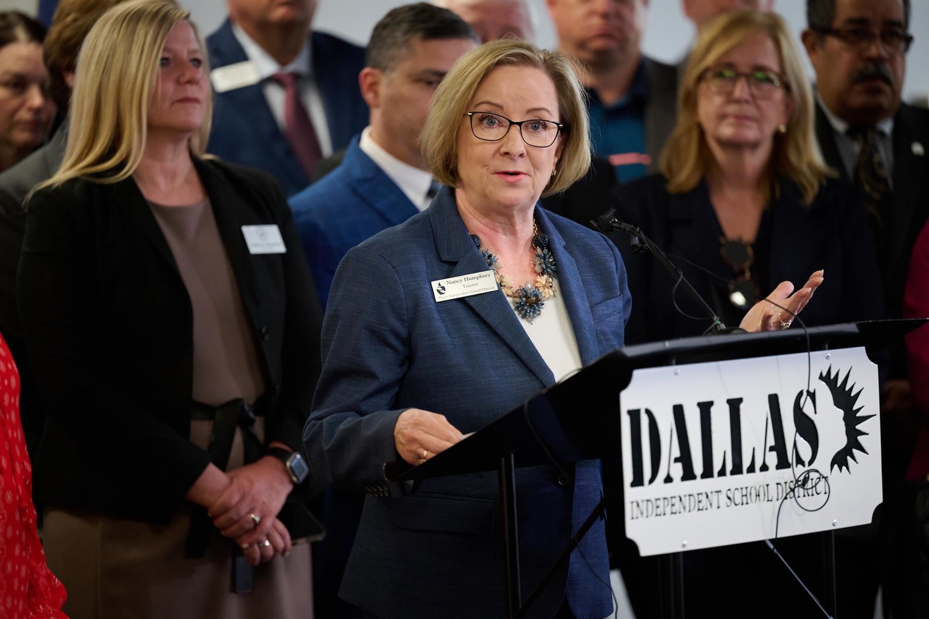 plano isd board vice president nancy humphrey speaking at podium